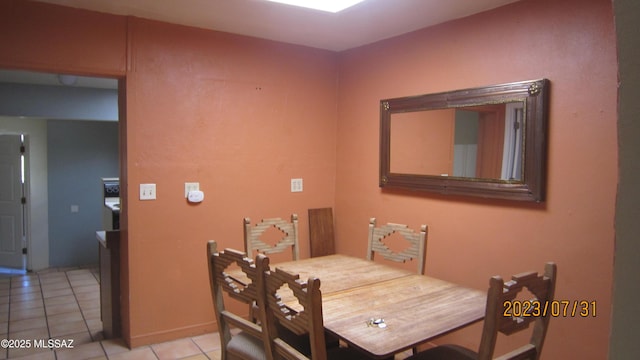 dining room with light tile patterned floors