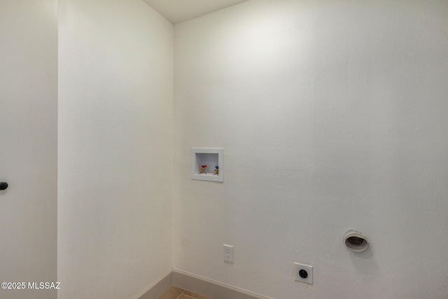 laundry room featuring electric dryer hookup, washer hookup, and laundry area