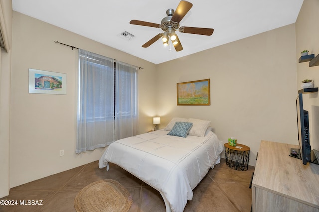 bedroom featuring visible vents and a ceiling fan