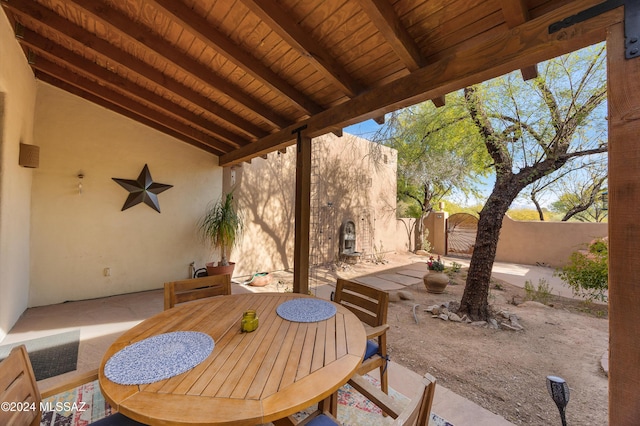 view of patio / terrace with a gate and fence