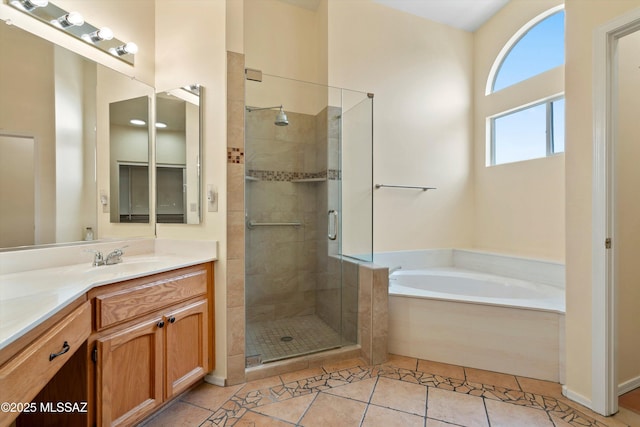 36973 S Highland Ridge Ct, Tucson, AZ 85739 - bathroom with vanity, a garden tub, a shower stall, and tile patterned flooring