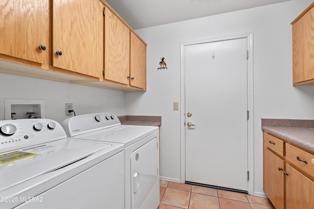 36973 S Highland Ridge Ct, Tucson, AZ 85739 - laundry area featuring cabinet space, independent washer and dryer, and light tile patterned floors