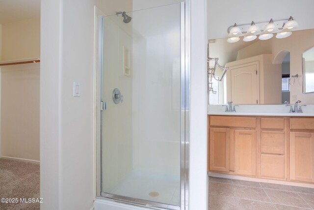 154 W Calle Patio Lindo, Sahuarita, AZ 85629 - full bath featuring a shower stall, double vanity, and a walk in closet