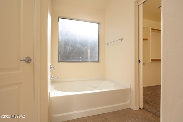 154 W Calle Patio Lindo, Sahuarita, AZ 85629 - bathroom with a bath and tile patterned flooring