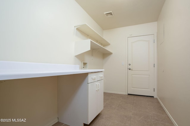 154 W Calle Patio Lindo, Sahuarita, AZ 85629 - clothes washing area with light tile patterned floors and baseboards