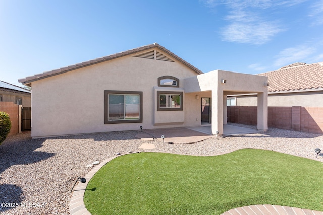 154 W Calle Patio Lindo, Sahuarita, AZ 85629 - rear view of property with a fenced backyard, a patio, stucco siding, and a tile roof