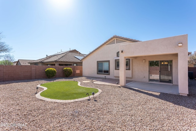 154 W Calle Patio Lindo, Sahuarita, AZ 85629 - rear view of property with stucco siding, a fenced backyard, and a patio