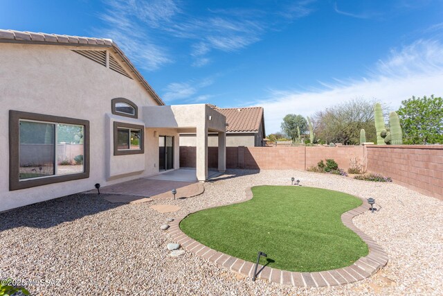 154 W Calle Patio Lindo, Sahuarita, AZ 85629 - fenced backyard with a patio