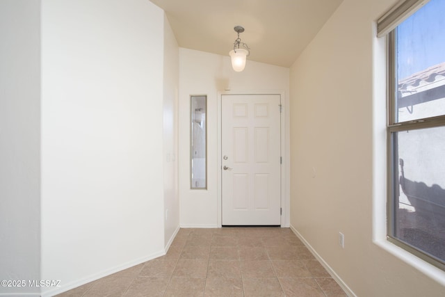 154 W Calle Patio Lindo, Sahuarita, AZ 85629 - hall with baseboards, lofted ceiling, and light tile patterned flooring