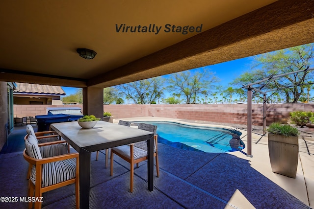view of pool with outdoor dining area, a fenced in pool, a fenced backyard, and a patio area