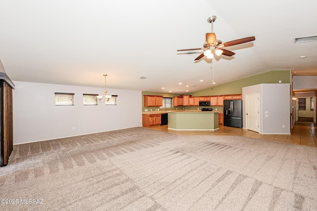 unfurnished living room with a ceiling fan, visible vents, lofted ceiling, recessed lighting, and light carpet
