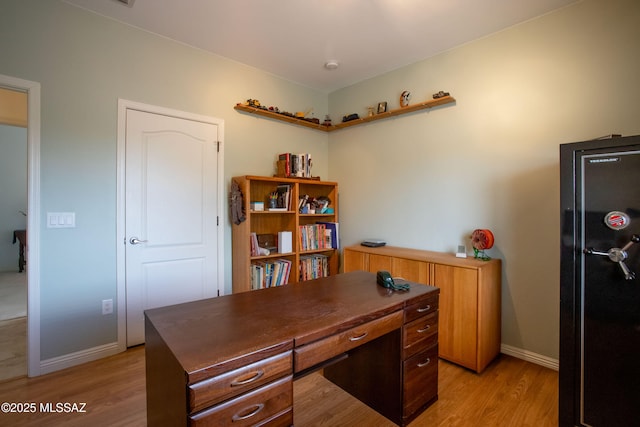 14938 N Gwynns Run Dr, Tucson, AZ 85739 - home office with light wood-style floors and baseboards