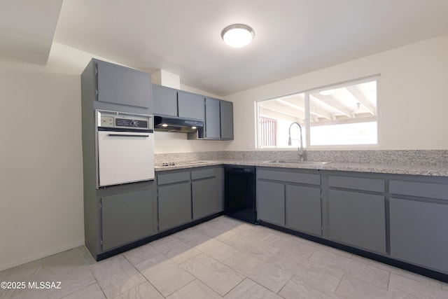 kitchen with stovetop, a sink, black dishwasher, under cabinet range hood, and white oven