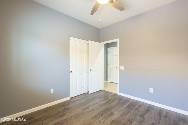 20868 E Treasure Rd, Red Rock, AZ 85145 - interior space featuring baseboards, ceiling fan, and wood finished floors