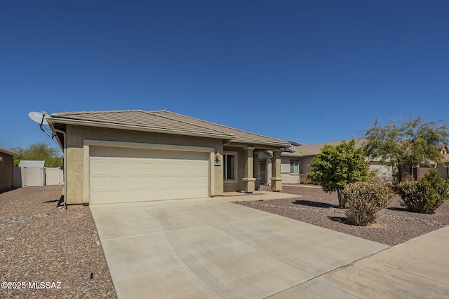 20868 E Treasure Rd, Red Rock, AZ 85145 - view of front of home featuring fence, an attached garage, stucco siding, concrete driveway, and a tiled roof