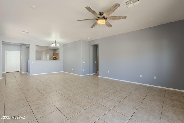 20868 E Treasure Rd, Red Rock, AZ 85145 - unfurnished living room featuring visible vents, ceiling fan with notable chandelier, and baseboards