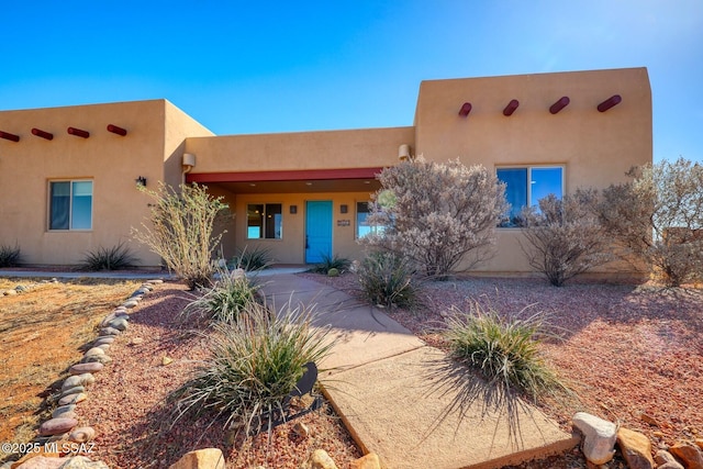 9505 S Deer Ridge Trl, Hereford, AZ 85615 - pueblo-style house with stucco siding