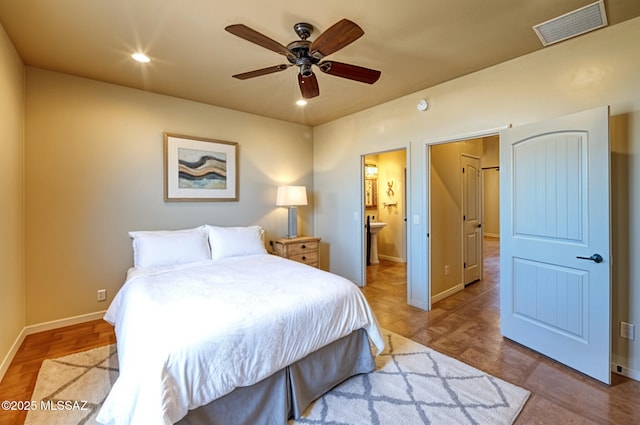 9505 S Deer Ridge Trl, Hereford, AZ 85615 - bedroom with recessed lighting, ceiling fan, ensuite bath, visible vents, and baseboards