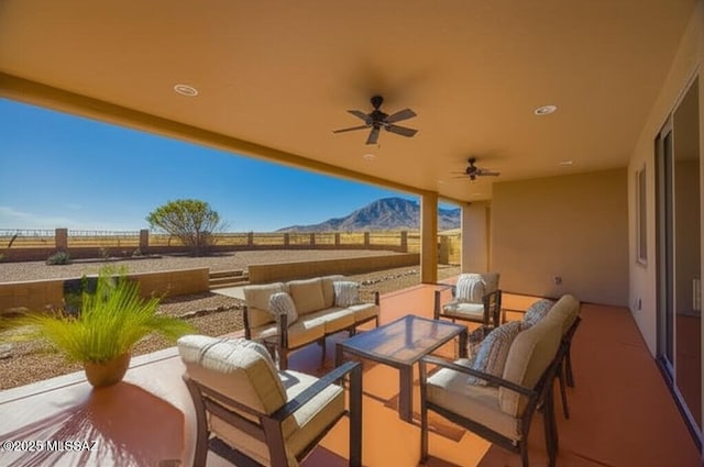 9505 S Deer Ridge Trl, Hereford, AZ 85615 - view of patio with a mountain view, outdoor lounge area, ceiling fan, and fence