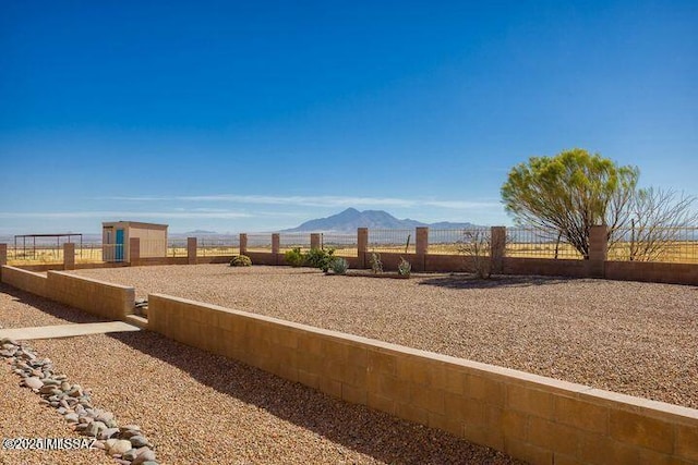 9505 S Deer Ridge Trl, Hereford, AZ 85615 - view of yard featuring fence and a mountain view