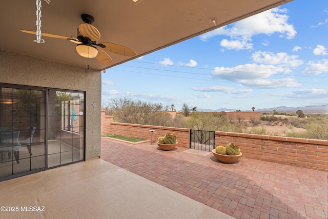 view of patio with ceiling fan