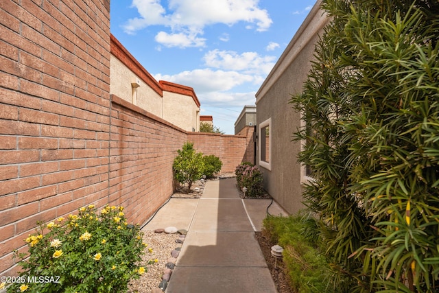 exterior space featuring a patio area and fence