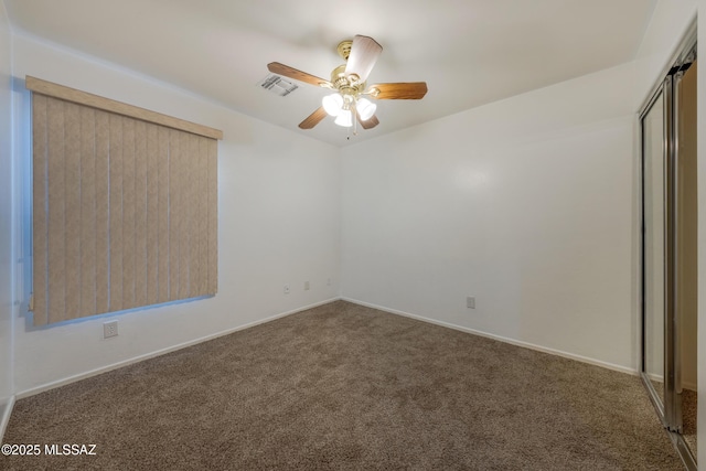 9379 E Grapevine Spring Pl, Tucson, AZ 85710 - carpeted empty room with ceiling fan and baseboards