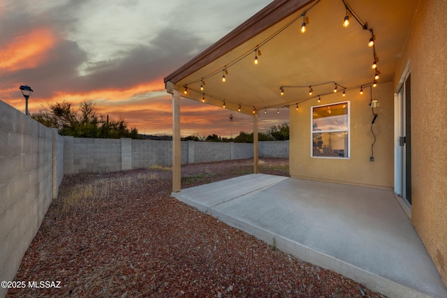 9379 E Grapevine Spring Pl, Tucson, AZ 85710 - fenced backyard with a patio