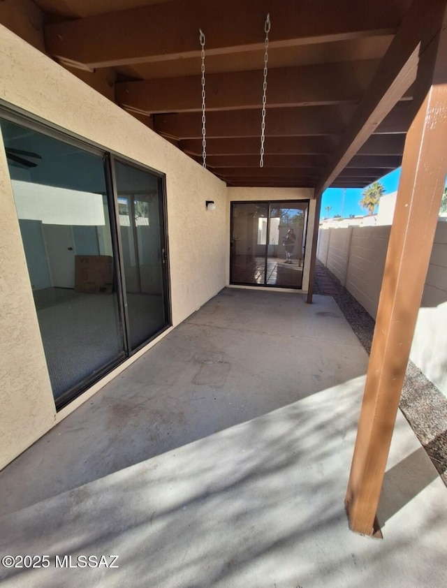 view of patio with fence