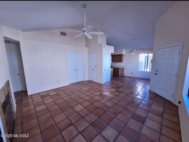 unfurnished living room featuring high vaulted ceiling, visible vents, and a ceiling fan