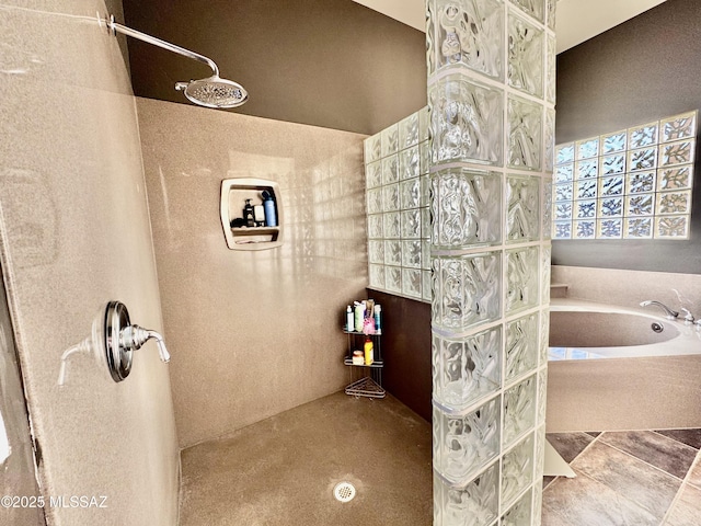bathroom with a bath and walk in shower