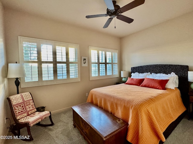 bedroom with carpet floors and a ceiling fan