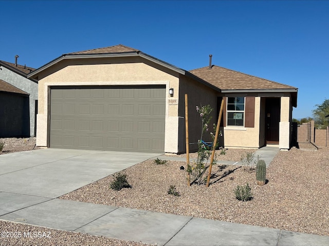 6169 S Rigby Way, Tucson, AZ 85746 - ranch-style home featuring a garage, stucco siding, and concrete driveway