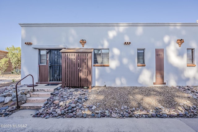view of front of home featuring stucco siding