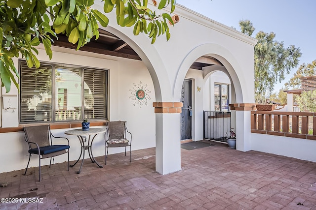 view of patio / terrace featuring fence