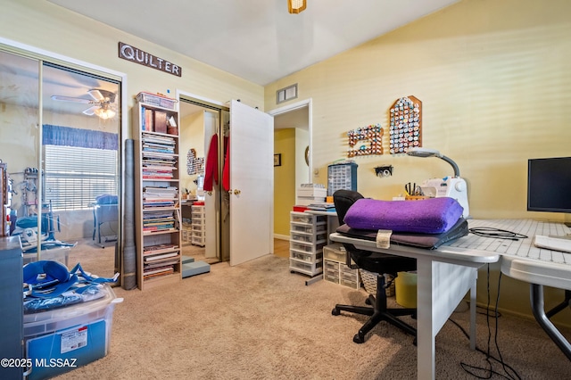 home office featuring carpet flooring and a ceiling fan