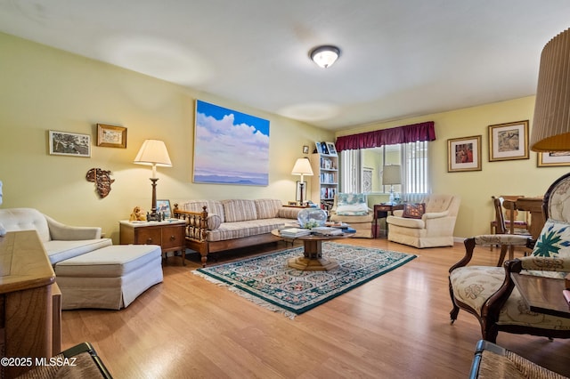 living room with wood finished floors
