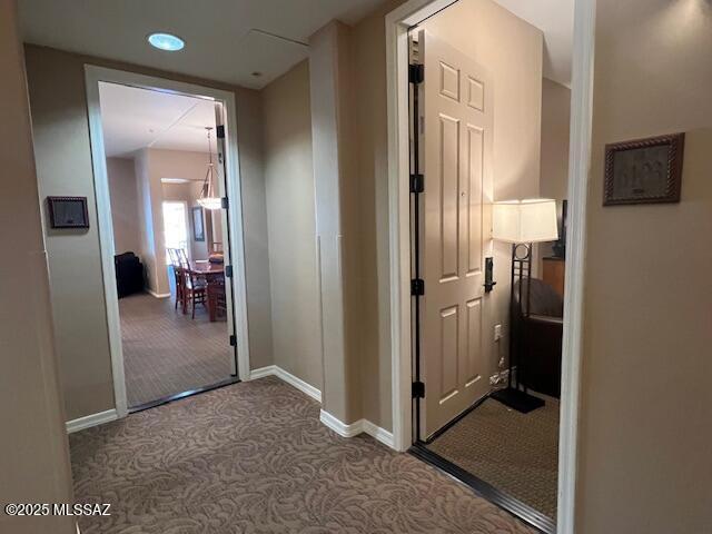 5775 S Camino Del Sol Unit 6104, Green Valley, AZ 85622 - corridor featuring carpet floors, baseboards, and recessed lighting