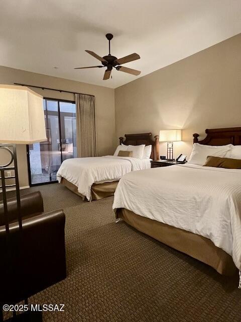 5775 S Camino Del Sol Unit 6104, Green Valley, AZ 85622 - bedroom featuring carpet, access to outside, and a ceiling fan