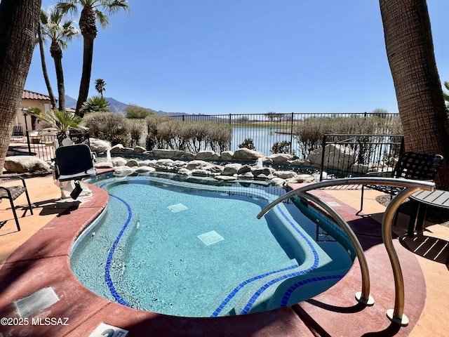 5775 S Camino Del Sol Unit 6104, Green Valley, AZ 85622 - view of swimming pool with a patio area and a water view