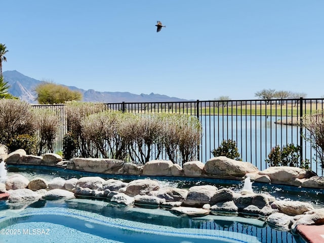 5775 S Camino Del Sol Unit 6104, Green Valley, AZ 85622 - view of swimming pool with a mountain view