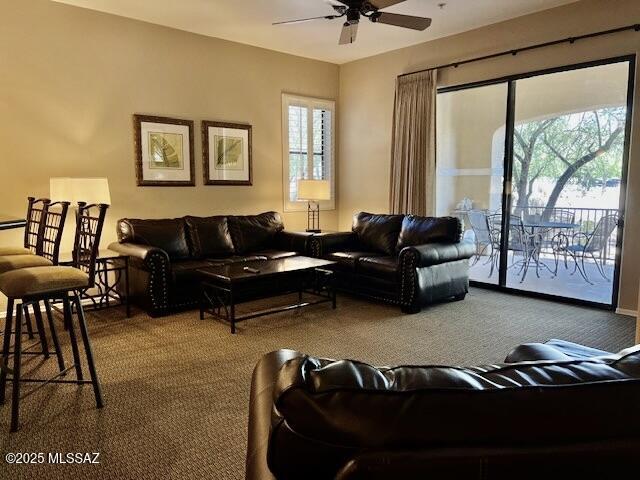 5775 S Camino Del Sol Unit 6104, Green Valley, AZ 85622 - living room featuring a ceiling fan and carpet