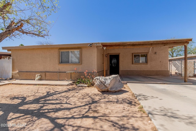 6806 S 4th Ave, Tucson, AZ 85756 - view of front of home with fence and a patio