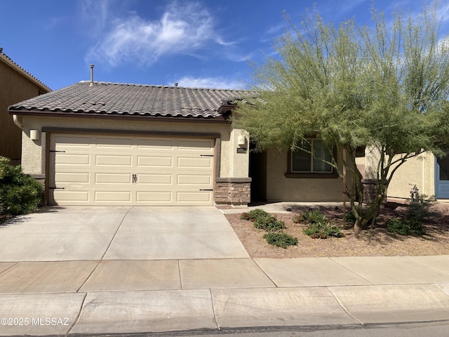 34932 S Iron Jaw Dr, Red Rock, AZ 85145 - view of front of home featuring stucco siding, concrete driveway, an attached garage, and a tiled roof