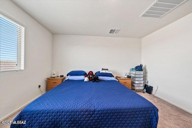 34932 S Iron Jaw Dr, Red Rock, AZ 85145 - carpeted bedroom featuring visible vents