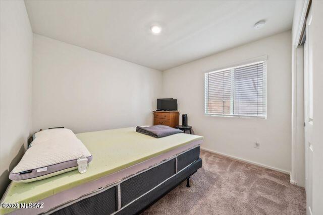 34932 S Iron Jaw Dr, Red Rock, AZ 85145 - bedroom with baseboards and carpet flooring