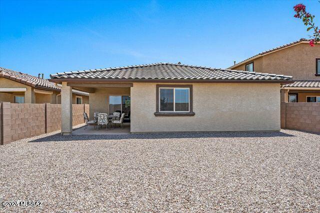 34932 S Iron Jaw Dr, Red Rock, AZ 85145 - rear view of property with stucco siding, a tiled roof, and a patio