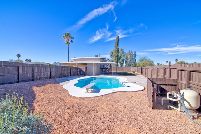 view of swimming pool with a fenced in pool, a fenced backyard, and a patio area