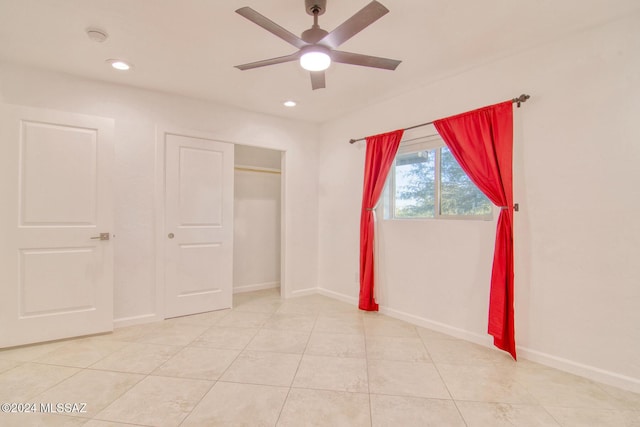 unfurnished bedroom with light tile patterned flooring, baseboards, and recessed lighting