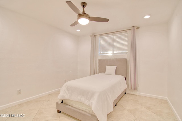 bedroom featuring a ceiling fan, baseboards, recessed lighting, and light tile patterned floors